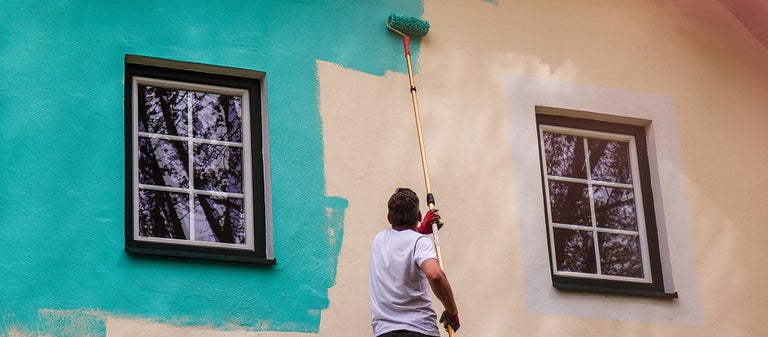 House exterior being painted